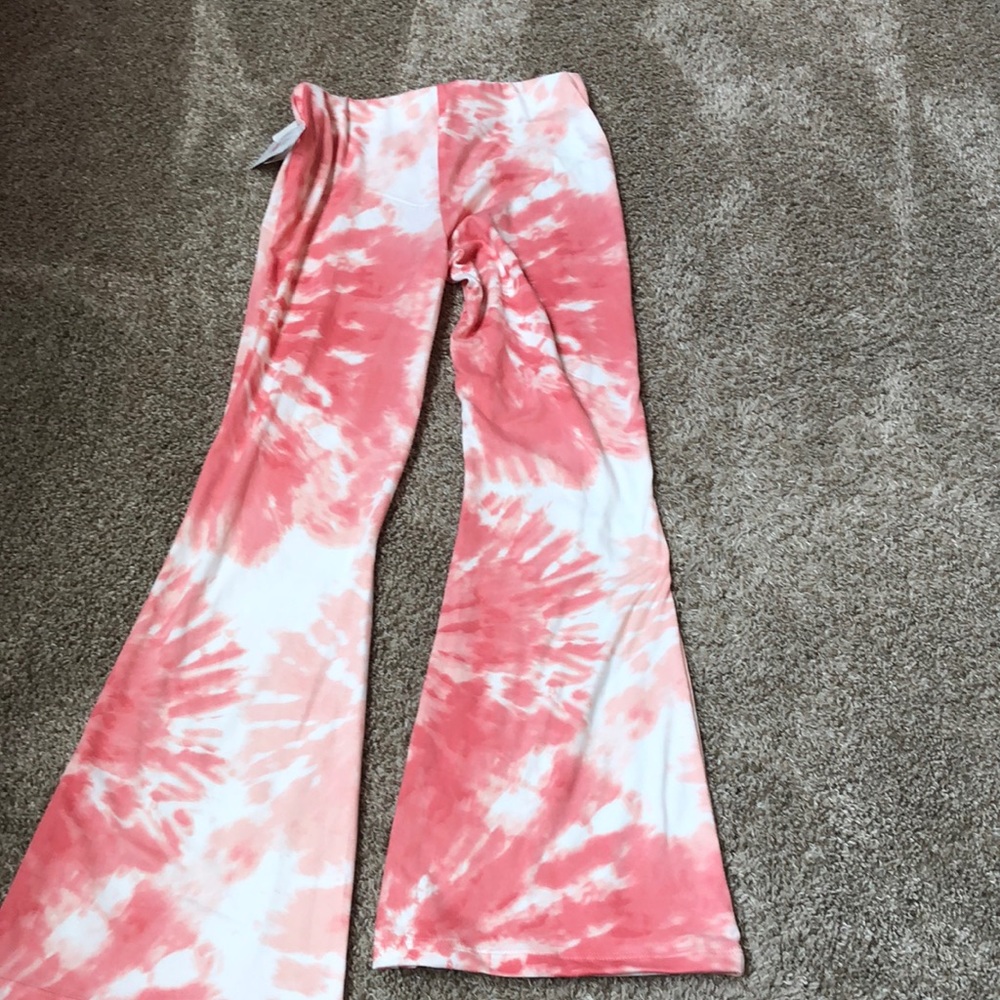 Hey,these are new girl kid pants their white and pink very cute